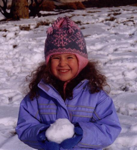 Emma with a snowball.