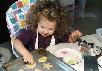 Emma making cookies.